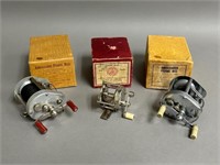 Trio of Fishing Reels in Boxes