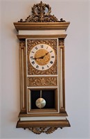 Eyroco handing wall clock. 13 1/2" w x 35" h
