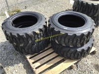 E. set/4 new 10-16.5 skid steer tires
