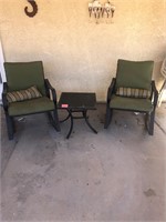 Two rocking chairs with small patio table #147