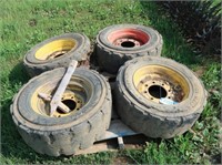 (4) 10 x 16.5 Skid Steer Tires