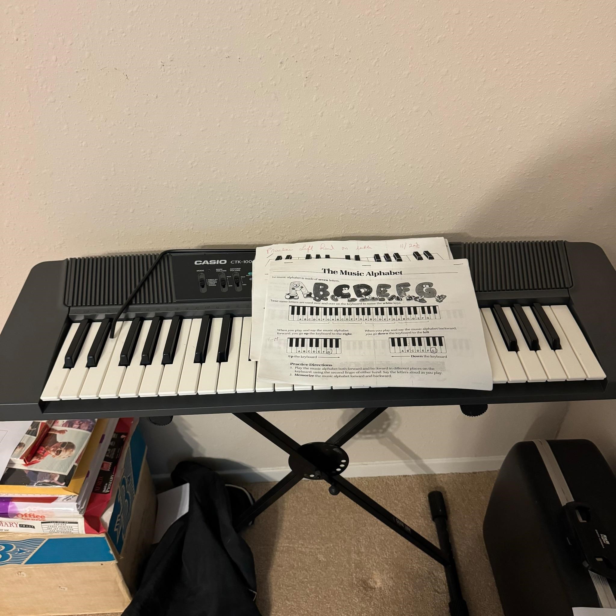 Casio Electric Keyboard & Stand, Powers On