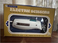 Antique electric scissors with pin holders