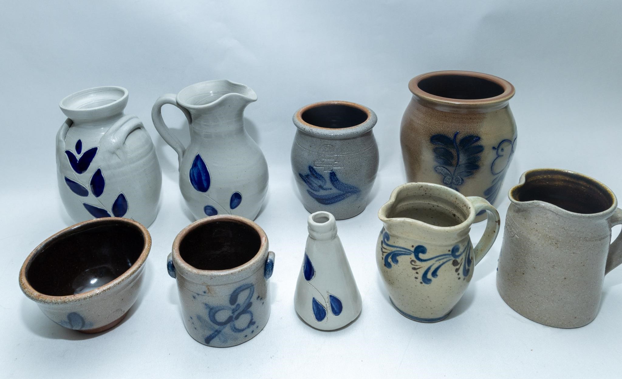 Nine pieces of studio art pottery, signed