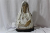 A Wooden St. Mary Figure