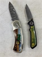 2 pocket knives with tractor design