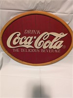 Yellow and Red Coke Sign