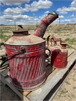 Vintage fuel cans and barrel pump