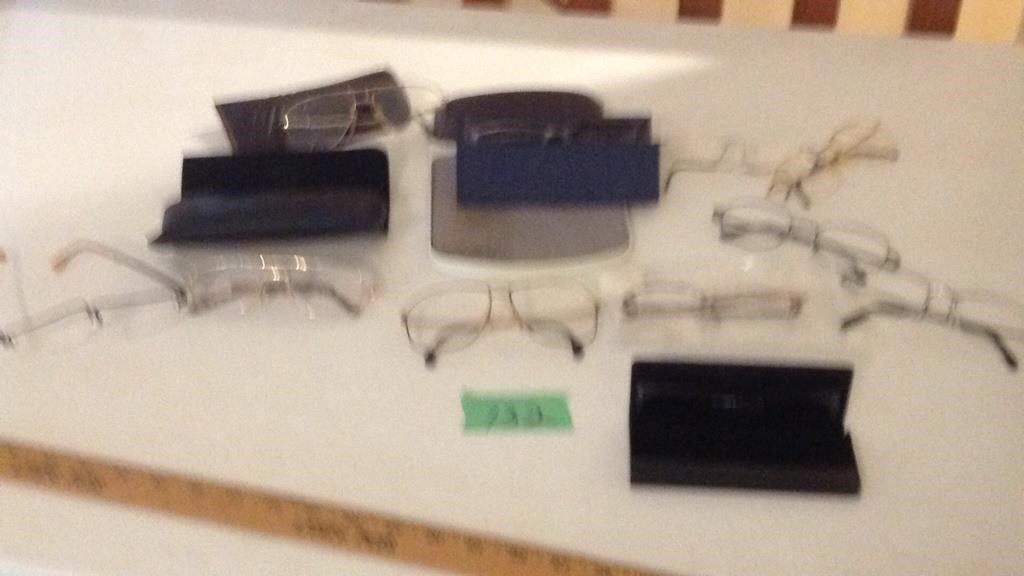 Assorted glasses and cases