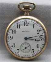 Gold Colored Pocket Watch.