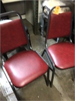 2 New Dark red vinyl stack chairs