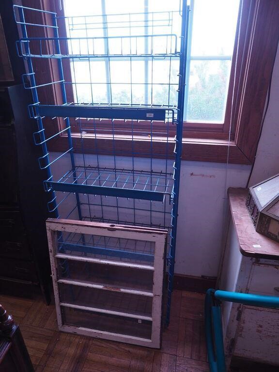 Blue wire display shelf and an old window