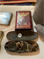 Antique Glasses and Tobacco Tin