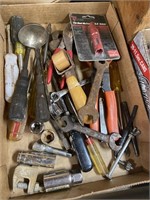 assorted tools including wrenches screwdrivers