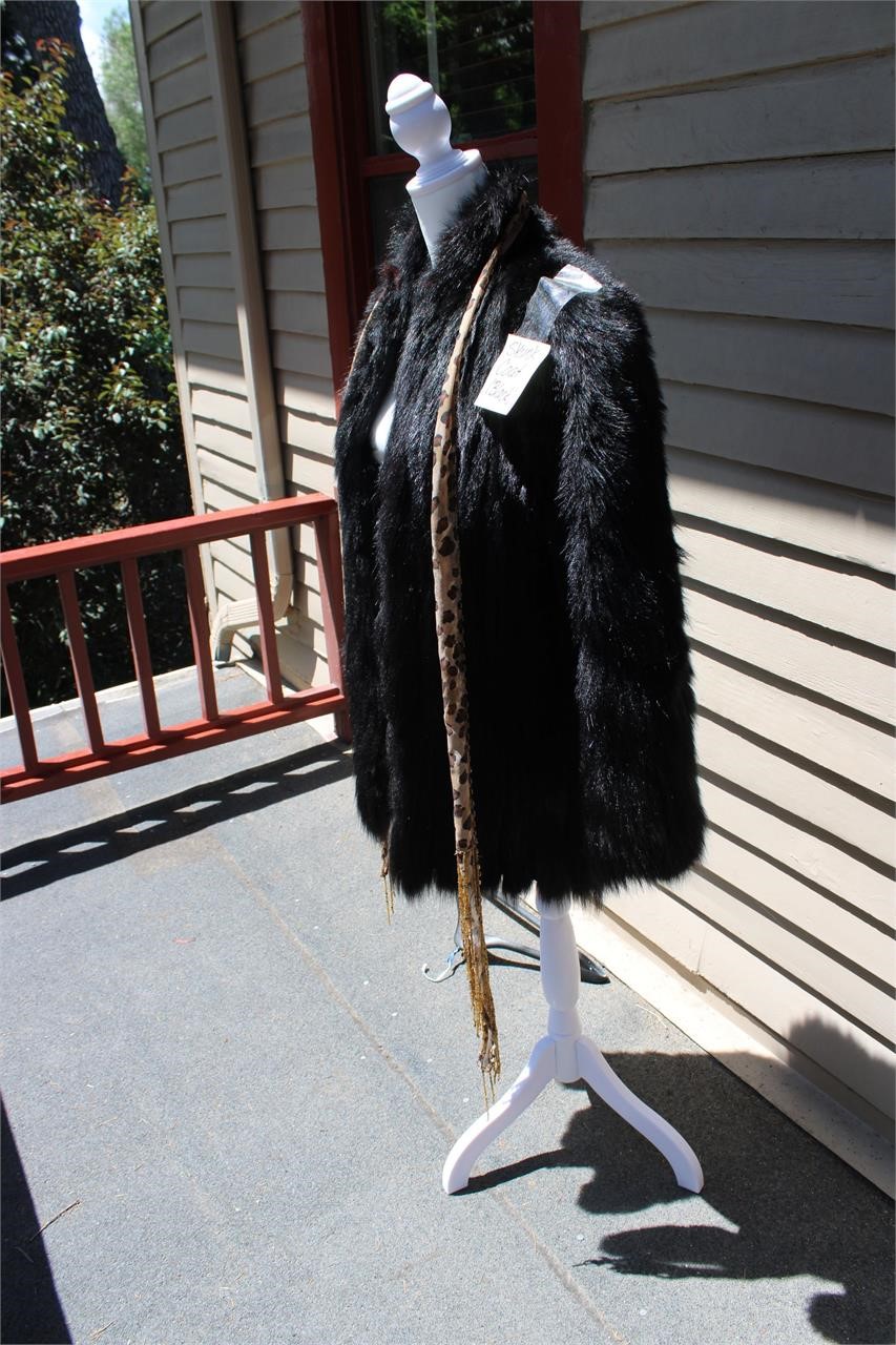 Skunk Mid-length black coat