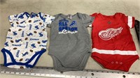 Detroit Lions and red wings 18 month onesies