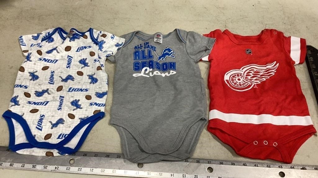 Detroit Lions and red wings 18 month onesies