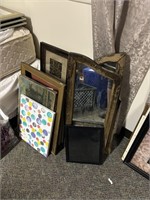 lot of wall decor, picture frames prints etc.