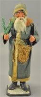 TALL AND GREEN ROBED FATHER CHRISTMAS