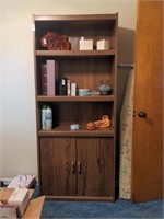 Book case with cabinet on bottom and adjustable