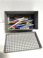 Bin of sharpies, pens, pencils