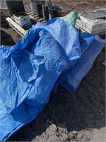 Quantity of tarps condition and sizes unknown