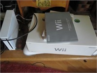 WII GAME COUNCIL WITH GAMES AND FIT BIT BOARD AND