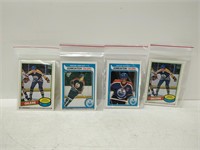 4 Gretzky cards in plastic sleeves