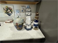POTTERY JUG AND TWO WOODEN LIGHTHOUSES
