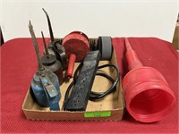 Group of oil cans, funnel and few other tools