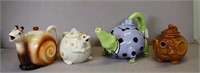 Four various ceramic novelty teapots