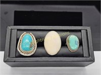 THREE STERLING SILVER GEMSTONE FASHION RINGS