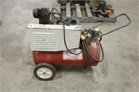 RED AND WHITE AIR COMPRESSOR, WORKS PER SELLER