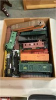 Box lot of HO scale train cars, some parts and