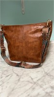New large leather bag. Adjustable strap can be