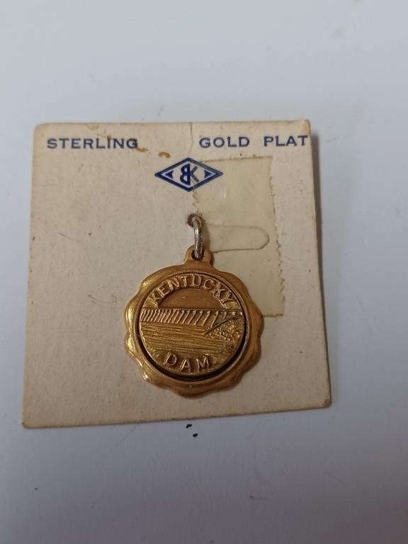 Marked asserting Gold Plate Kentucky DAM Pendant