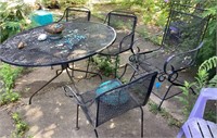 Metal patio table and four chairs