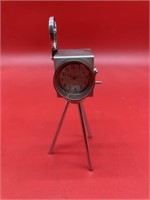 Nissan miniature desk clock as a vintage cinema