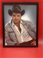 Autographed Mickey Gilley framed photo