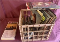 Assortment of records, cassettes, and cds