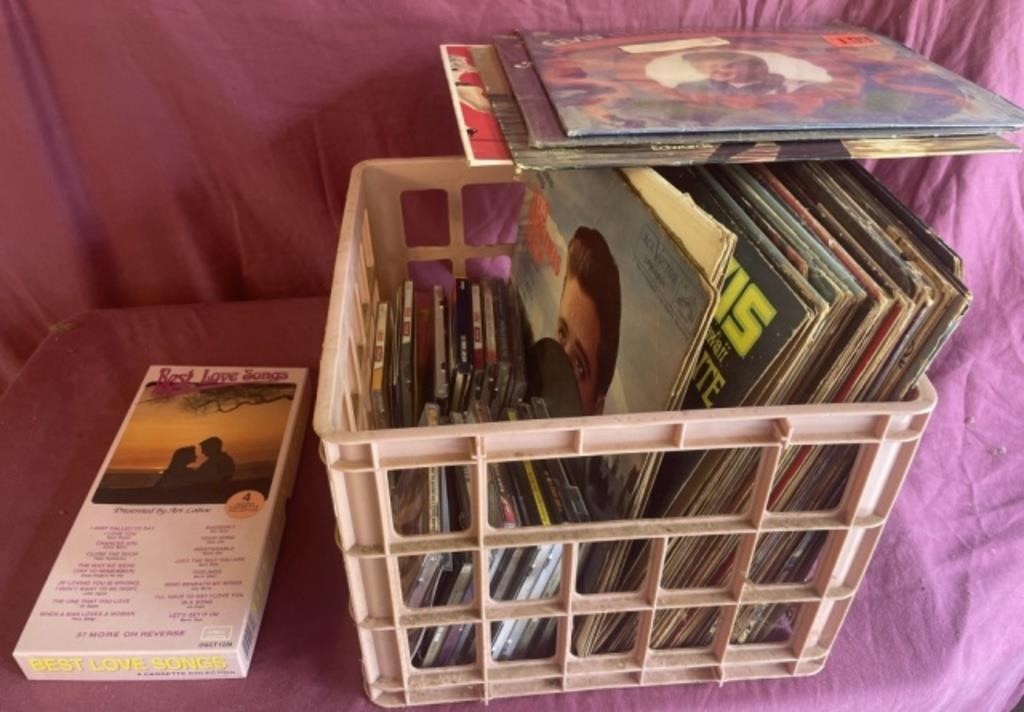 Assortment of records, cassettes, and cds