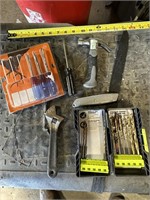 assorted drill bits, screw drivers, utility knife.