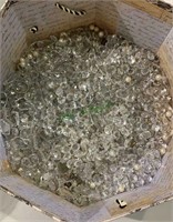 Hat box filled with hanging crystals in different