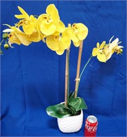 Art. yellow orchids, white vase