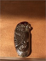 JIMMY BUFFET FANS HERE IS YOUR PARROT HEAD LIGHTER