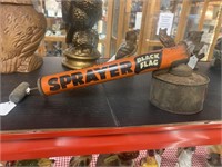 Vintage pump metal bug sprayer. Black flag.