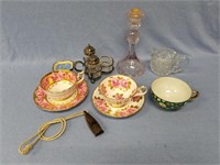 Lot with tea cup and saucers, manganese glass cand
