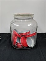 Vintage 9" jar with red lids