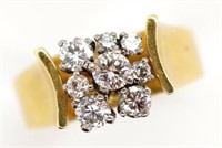 Eight stone diamond and 18ct yellow gold ring