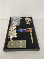 display case, military pin, medals, necklace,